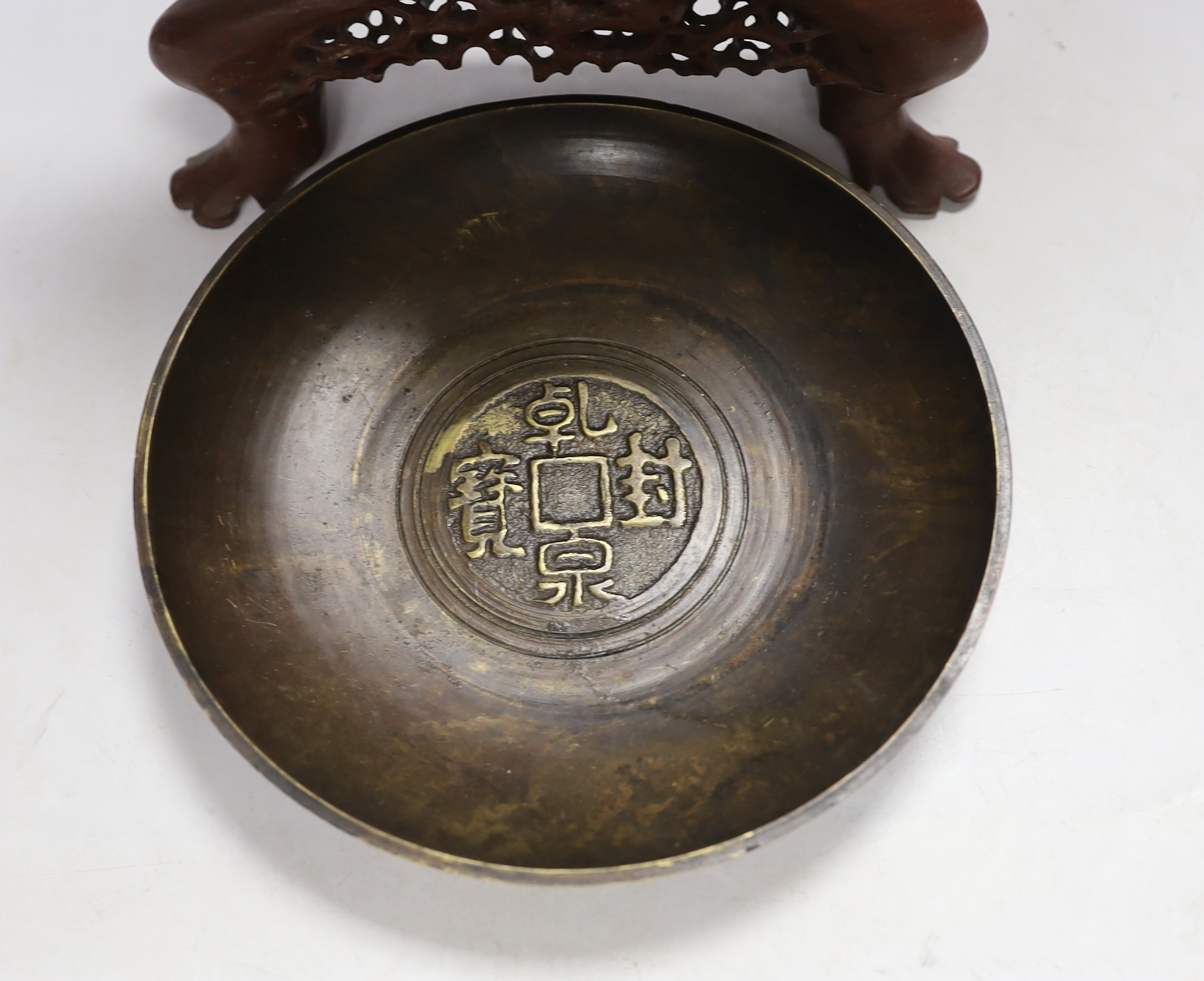 A Chinese carved soapstone tablescreen and a bronze 'coin' dish, largest 30cm high